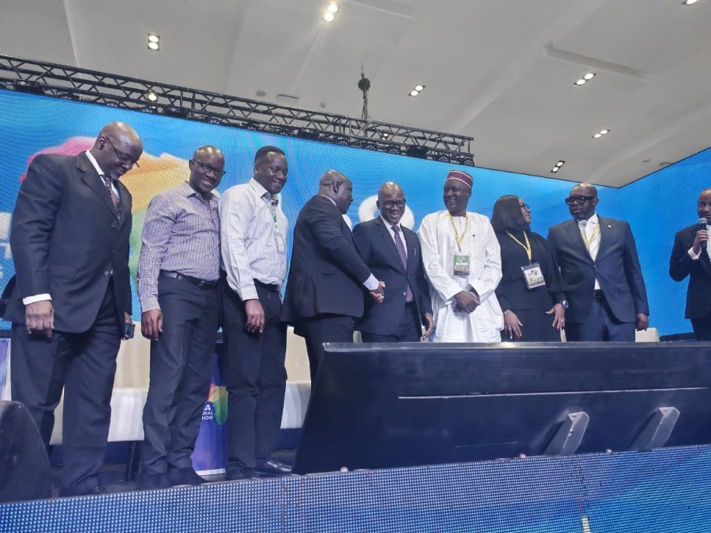 Dr. Ayodele Edwards at the Africa International Housing Show AIHS 2025 in Abuja, engaging industry leaders on sustainable housing delivery and project management excellence